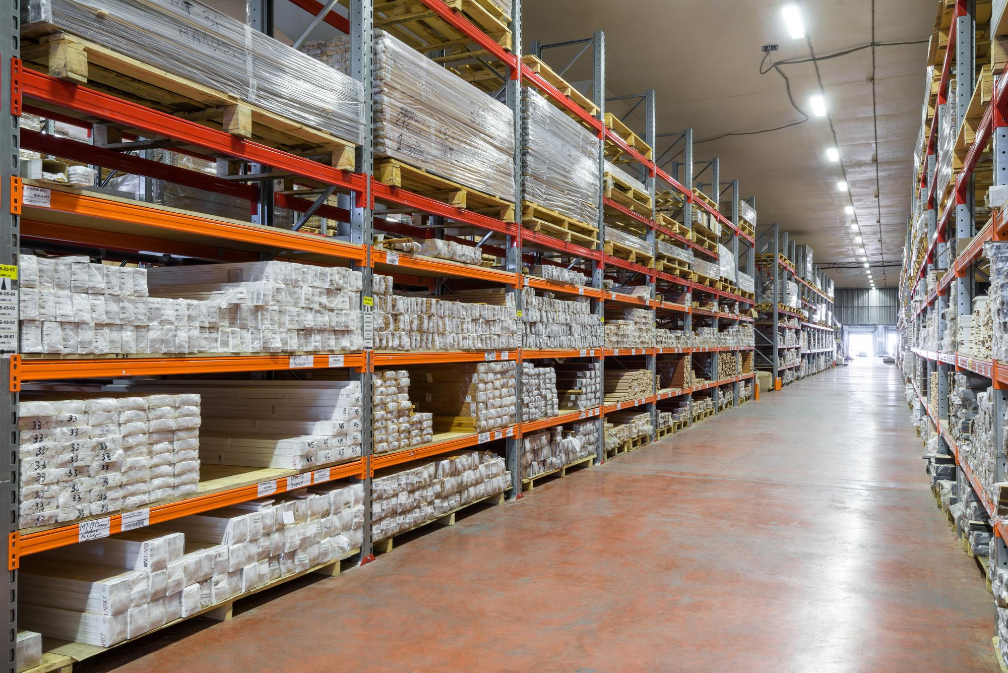 Timber and building materials stacked on racking in the Hawk Supplies yard